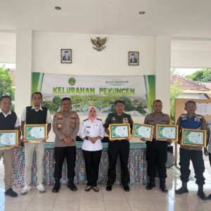 Tulus Melayani, Polisi RW Polres Pasuruan Kota dan Babinsa Terima Penghargaan dari Lurah Pekuncen