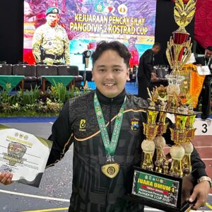 *Personel Polres Lamongan, Bripda Sholeh Maulana, Raih Medali Emas di Pencak Silat Pangdivif 2 Cup 2025*